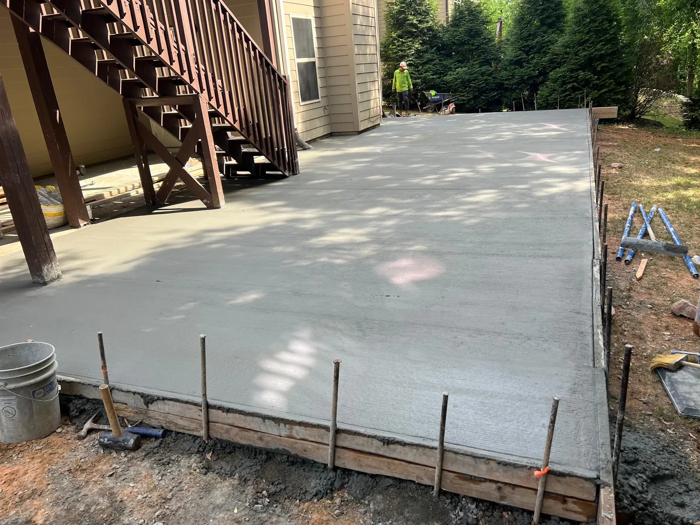 Large backyard concrete patio in Lawrenceville GA